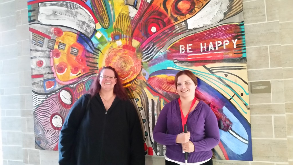 Kerri and I in front of the Be Happy painting at RMH